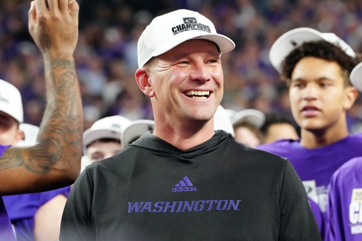 Dec 1, 2023; Las Vegas, NV, USA; Washington Huskies head coach Kalen DeBoer reacts as players celebrate after the Huskies defeated the Oregon Ducks 31-34 to win the Pac-12 Championship at Allegiant Stadium.