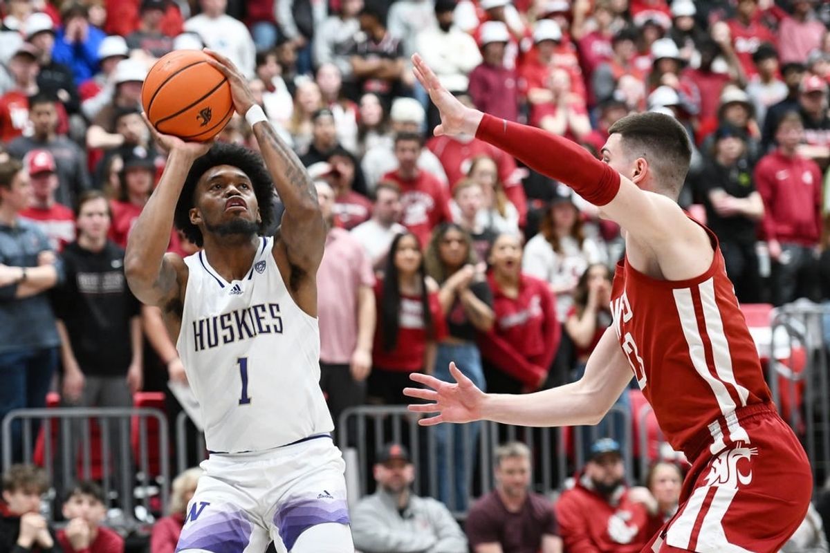 Mar 7, 2024; Pullman, Washington, USA; Washington Huskies forward Keion Brooks Jr. (1) shoots the ball against Washington State Cougars forward Andrej Jakimovski (23) in the first half at Friel Court at Beasley Coliseum.