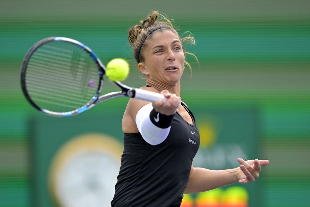 Mar 7, 2024; Indian Wells, CA, USA;   Sara Errani (ITA) hits a shot during her first round match against Naomi Osaka (JPN) in the BNP Paribas Open at the Indian Wells Tennis Garden.