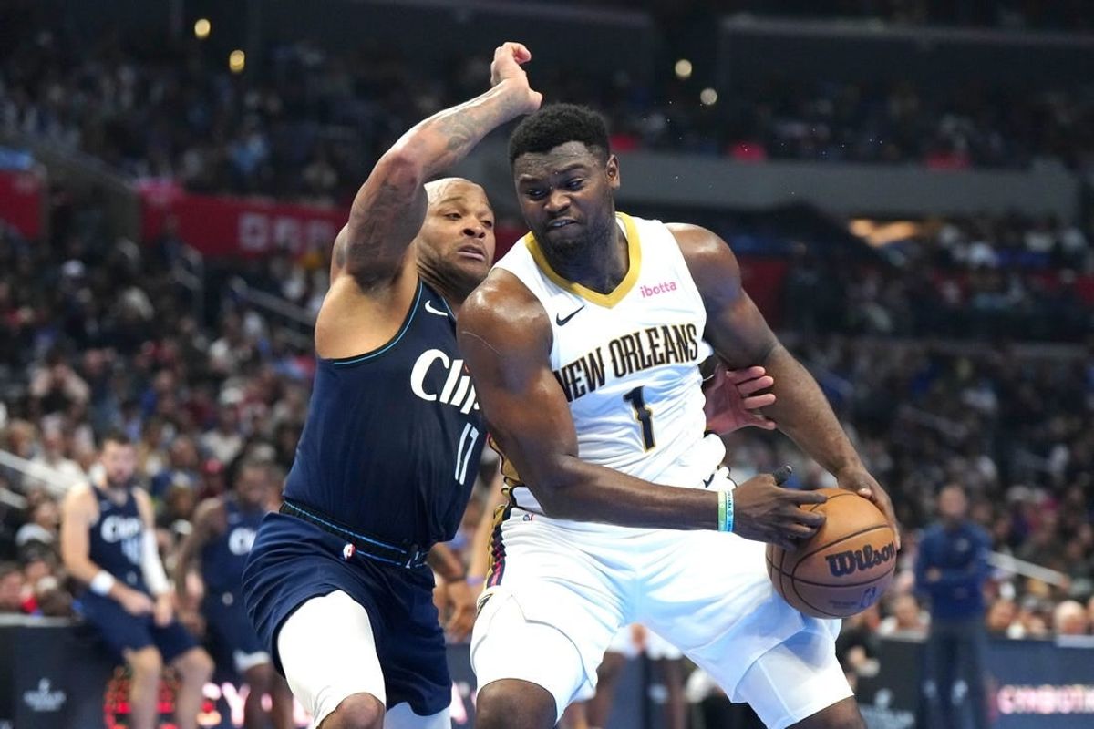 Nov 24, 2023; Los Angeles, California, USA; New Orleans Pelicans forward Zion Williamson (1) moves to the basket against LA Clippers forward P.J. Tucker (17) in the first half at Crypto.com Arena.