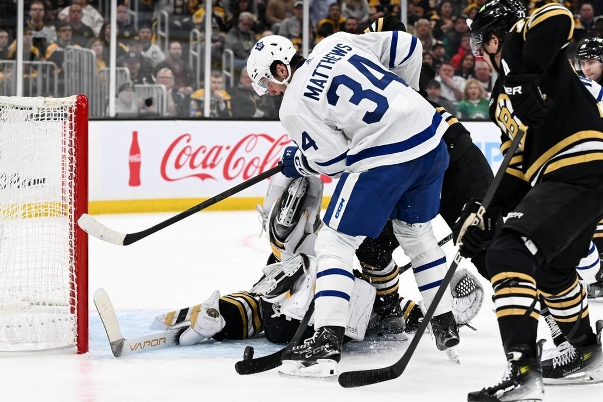 Apr 22, 2024; Boston, Massachusetts, USA; Boston Bruins goaltender Linus Ullmark (35) makes a save on shot by Toronto Maple Leafs center Auston Matthews (34) during the second period in game two of the first round of the 2024 Stanley Cup Playoffs at TD Garden.
