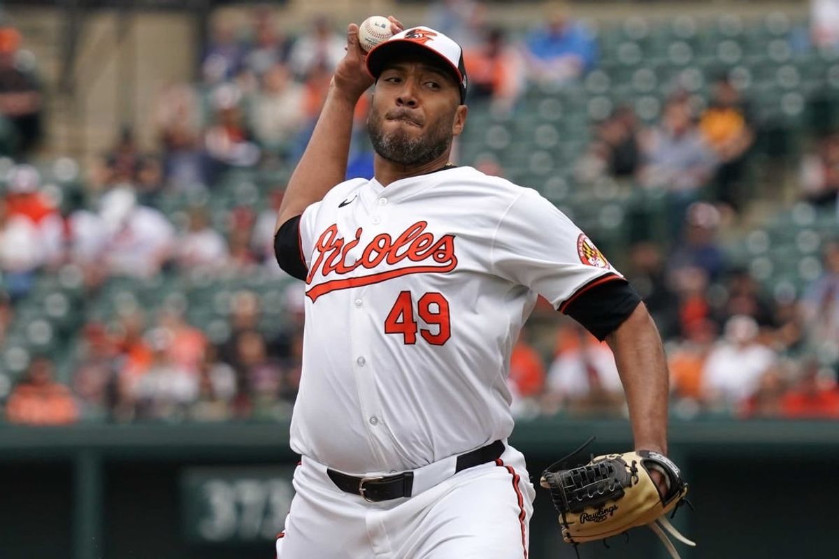 Apr 17, 2024; Baltimore, Maryland, USA; Baltimore Orioles pitcher Albert Suarez (4) delivers in the first inning against the Minnesota Twins at Oriole Park at Camden Yards.