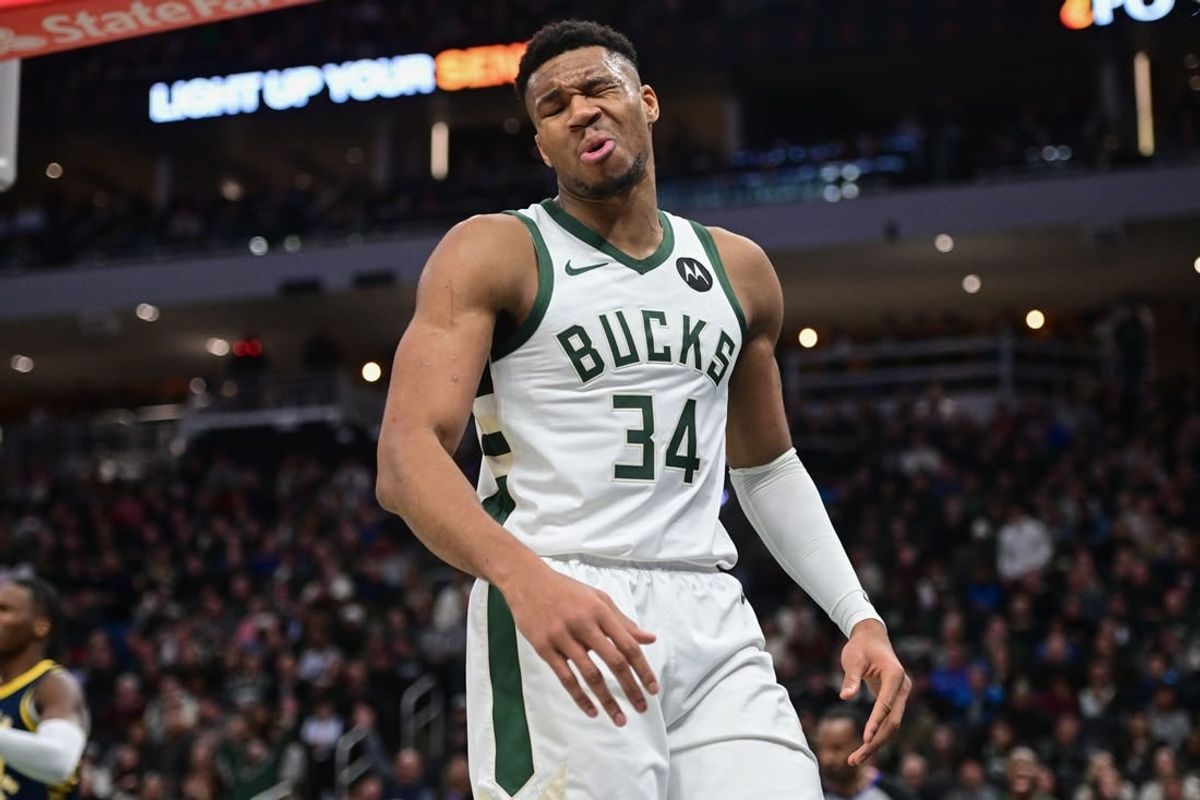 Dec 13, 2023; Milwaukee, Wisconsin, USA; Milwaukee Bucks forward Giannis Antetokounmpo (34) reacts after scoring a basket in the third quarter against the Indiana Pacers at Fiserv Forum.