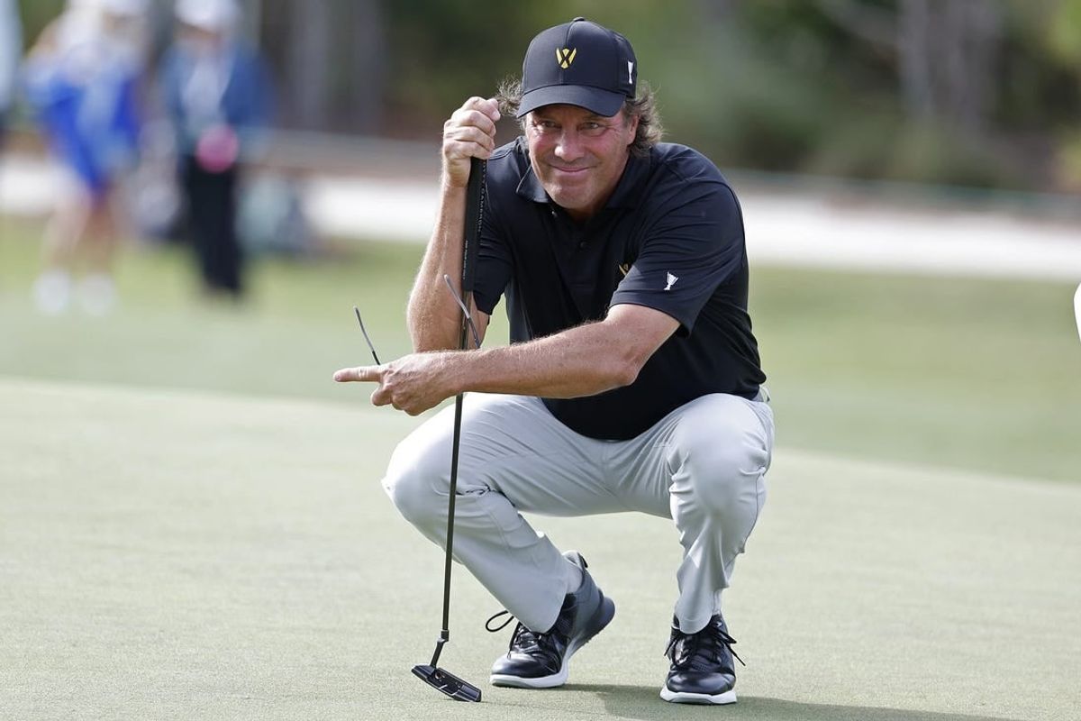 Dec 8, 2023; Bradenton, Florida, USA; Team International s Stephen Ames lines up a putt during their morning round at The Concession Golf Club.