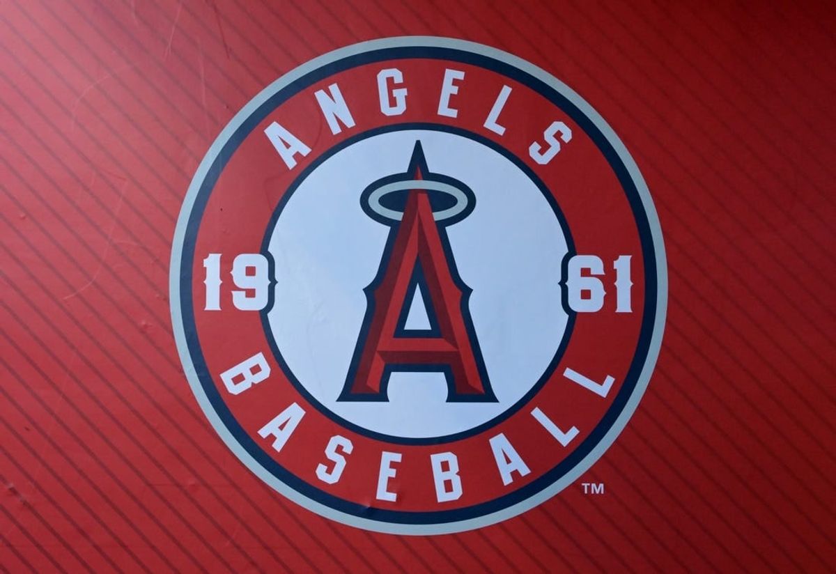 Jul 21, 2023; Anaheim, California, USA;  Detailed view of the Los Angeles Angels team logo on the wall of the dugout at Angel Stadium.