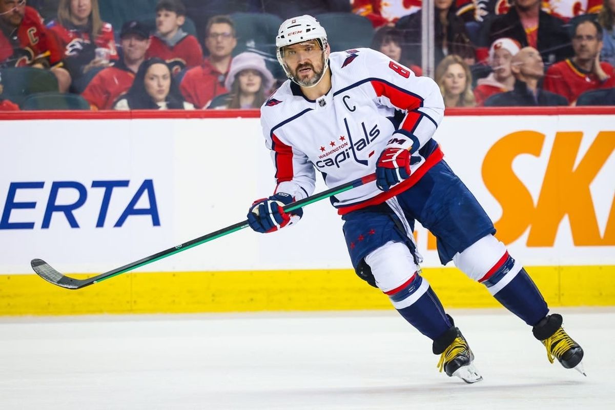 Mar 18, 2024; Calgary, Alberta, CAN; Washington Capitals left wing Alex Ovechkin (8) skates against the Calgary Flames during the third period at Scotiabank Saddledome.