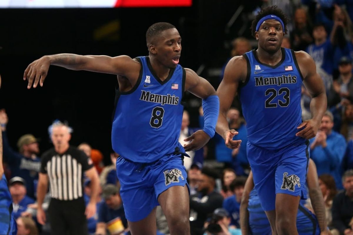 Dec 19, 2023; Memphis, Tennessee, USA; Memphis Tigers forward David Jones (8) reacts during the second half against the Virginia Cavaliers at FedExForum.