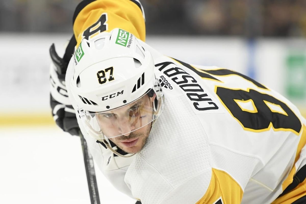 Jan 4, 2024; Boston, Massachusetts, USA; Pittsburgh Penguins center Sidney Crosby (87) gets set for a face off during the second period against the Boston Bruins at TD Garden.