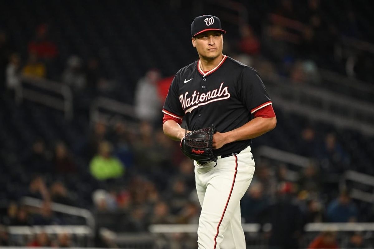 Apr 3, 2024; Washington, District of Columbia, USA; Washington Nationals relief pitcher Robert Garcia (61) walks off the mound against the Pittsburgh Pirates during the sixth inning at Nationals Park.