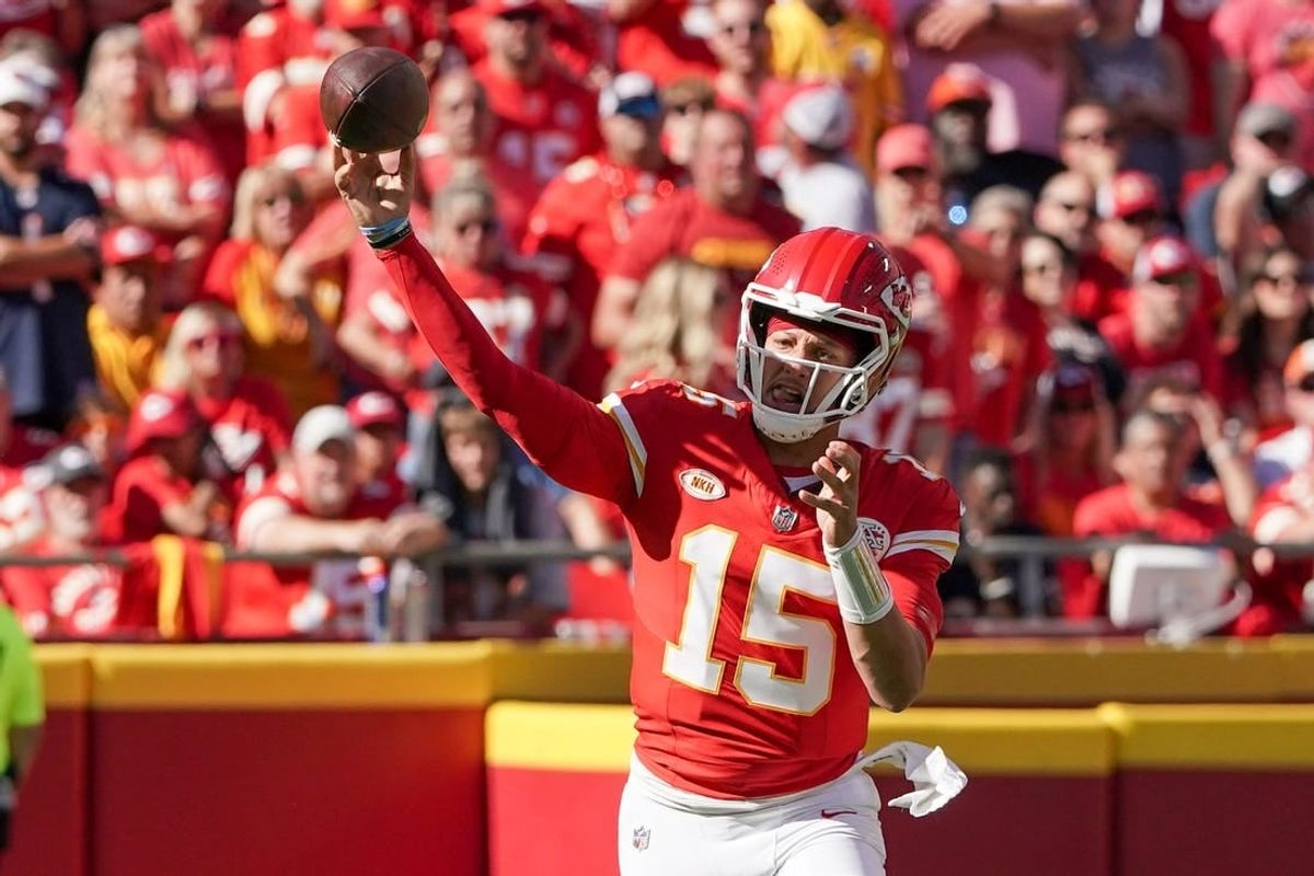 Sep 24, 2023; Kansas City, Missouri, USA; Kansas City Chiefs quarterback Patrick Mahomes (15) throws a pass against the Chicago Bears during the game at GEHA Field at Arrowhead Stadium.