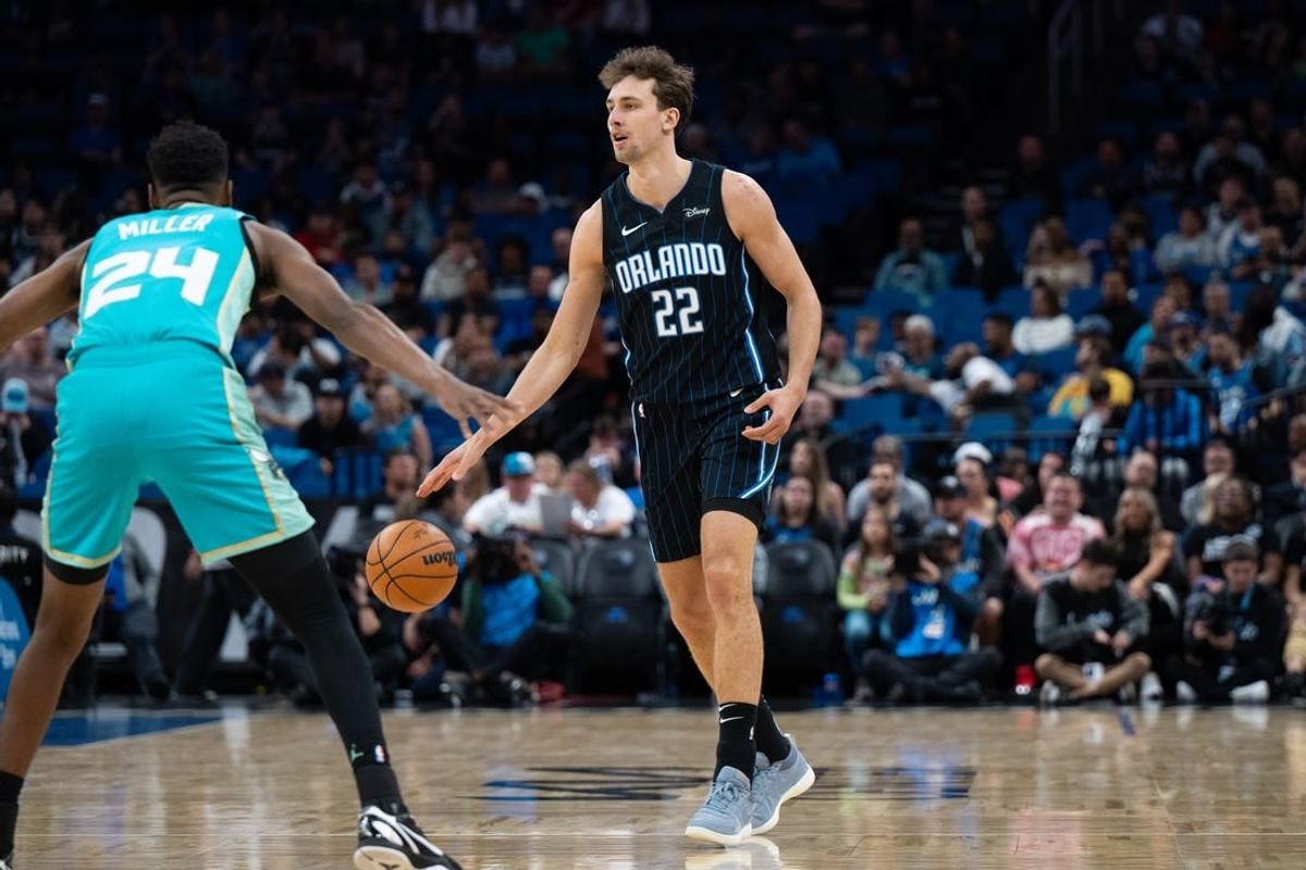 Mar 19, 2024; Orlando, Florida, USA; Orlando Magic forward Franz Wagner (22) dribbles the ball against Charlotte Hornets forward Brandon Miller (24) in the first quarter at KIA Center.