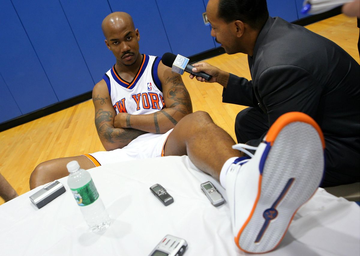 Stephon Marbury shows off his Starbury shoes