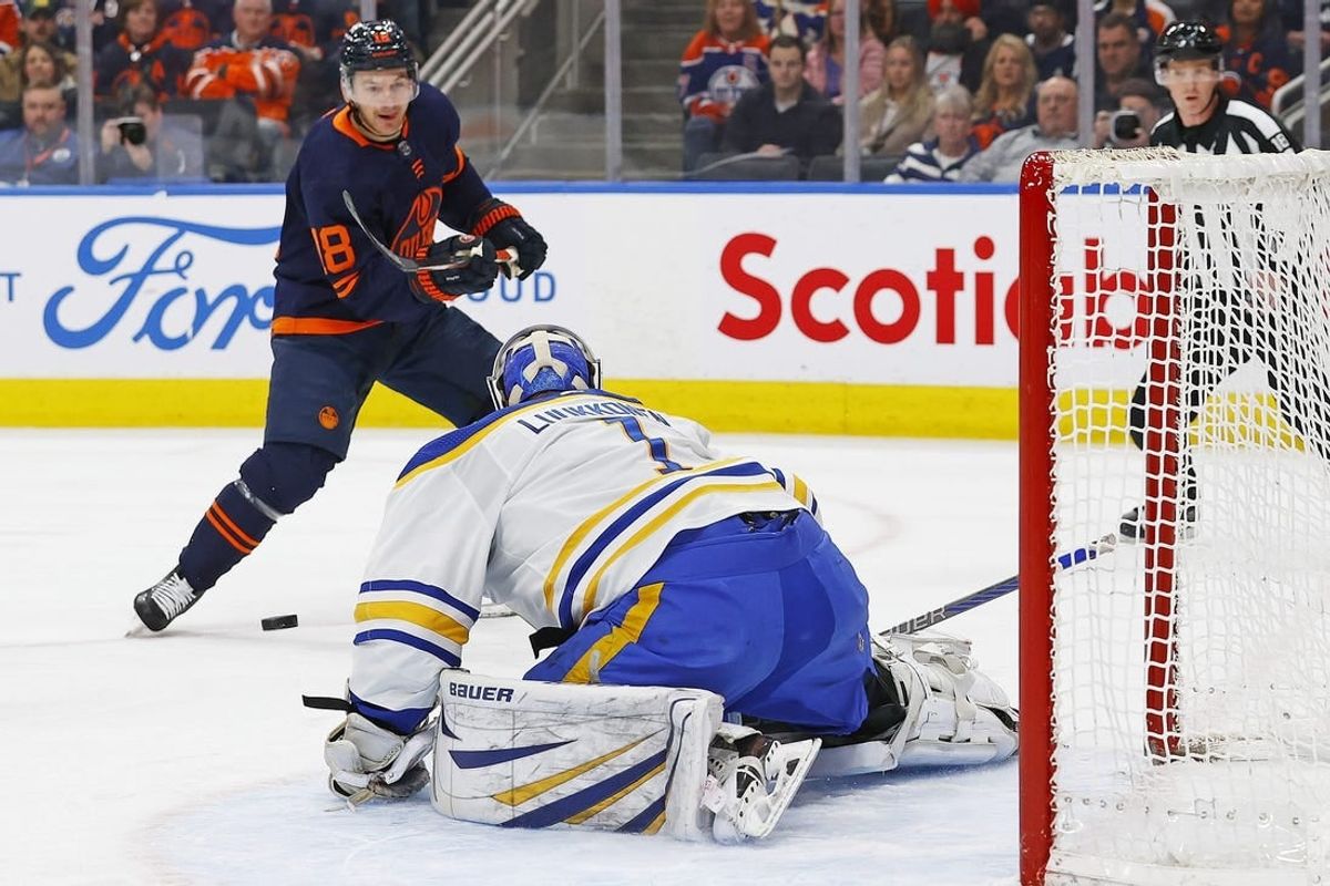 Mar 21, 2024; Edmonton, Alberta, CAN; Buffalo Sabres goaltender Ukko-Pekka Luukkonen (1) makes a save on  on Edmonton Oilers forward Zach Hyman (18) during the first period. at Rogers Place.