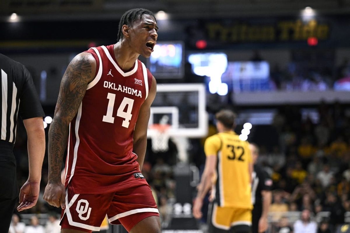 Nov 23, 2023; La Jolla, California, USA; Oklahoma Sooners forward Jalon Moore (14) celebrates after defeating the Iowa Hawkeyes at LionTree Arena.