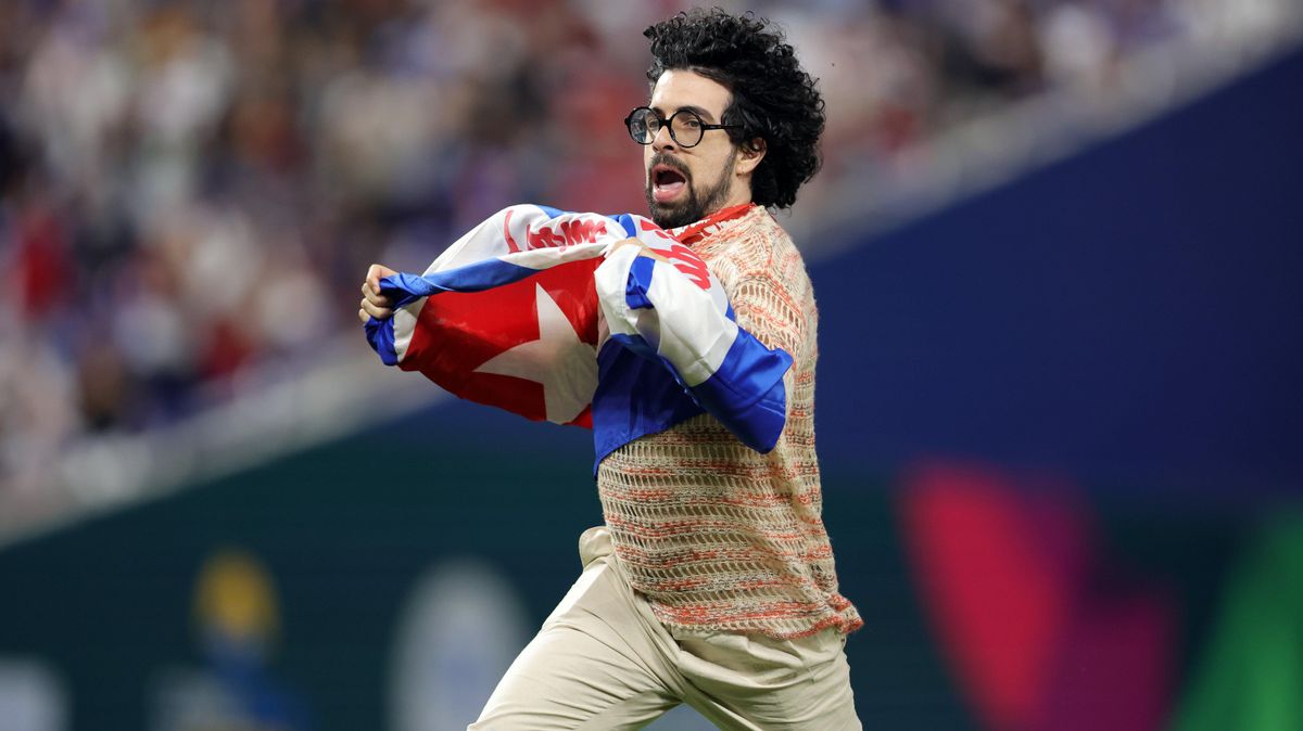 A fan runs on the field during the World Baseball Classic Semifinals between Team Cuba and Team USA at loanDepot park on March 19, 2023 in Miami, Florida.