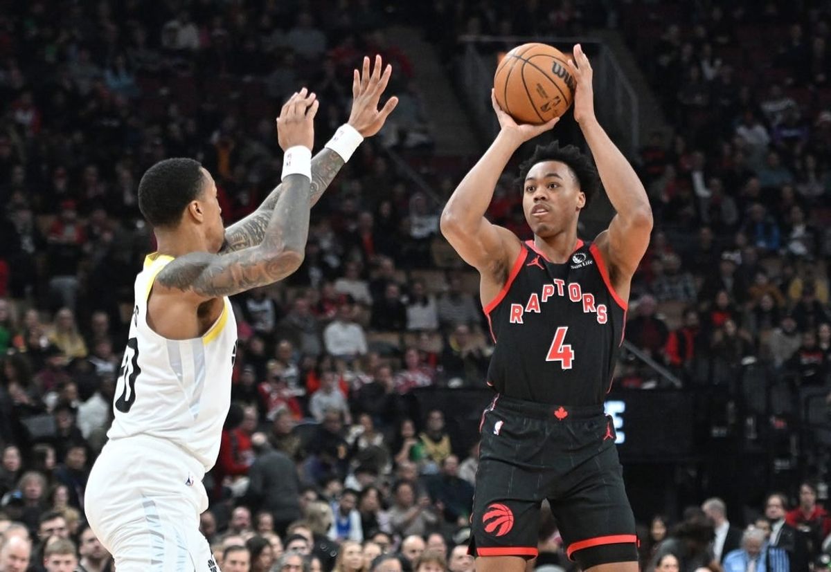 Dec 23, 2023; Toronto, Ontario, CAN;  Toronto Raptors forward Scottie Barnes (4) shoots the ball over Utah Jazz forward John Collins (20) in the first half at Scotiabank Arena.