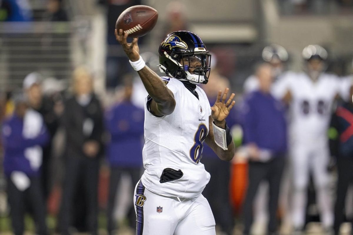 Dec 25, 2023; Santa Clara, California, USA; Baltimore Ravens quarterback Lamar Jackson (8) passes the football against the San Francisco 49ers during the first quarter at Levi's Stadium.