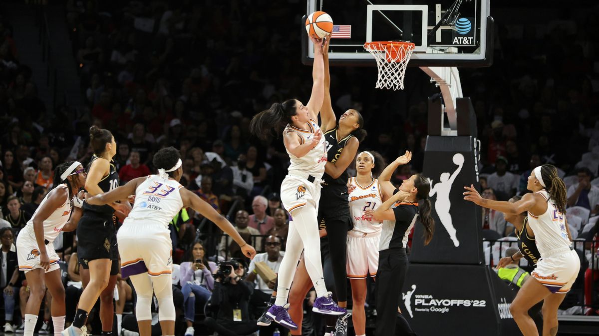 Megan Gustafson #10 of the Phoenix Mercury and Iliana Rupert # 21 of the Las Vegas Aces compete for a jump ball in the first quarter of Game Two of the 2022 WNBA Playoffs first round at Michelob ULTRA Arena on August 20, 2022 in Las Vegas, Nevada.