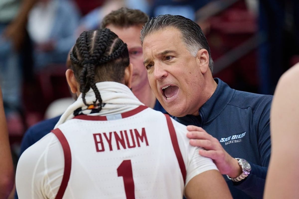 Dec 3, 2023; Stanford, California, USA; San Diego Toreros head coach Steve Lavin congratulates Stanford Cardinal guard Jared Bynum (1) after the game between the Stanford Cardinal and the San Diego Toreros at Maples Pavilion.