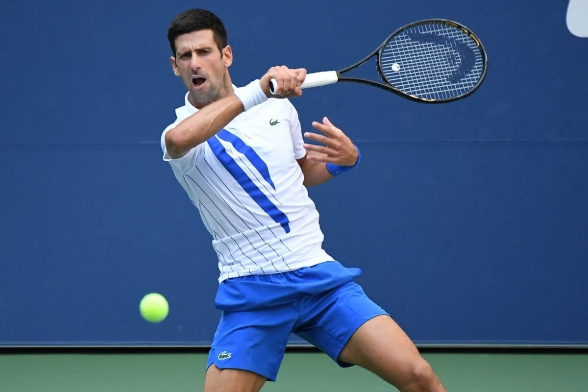 Sep 6, 2020; Flushing Meadows, New York, USA; Novak Djokovic of Serbia hits a forehand against Pablo Carreno Busta of Spain (not pictured) on day seven of the 2020 U.S. Open tennis tournament at USTA Billie Jean King National Tennis Center.