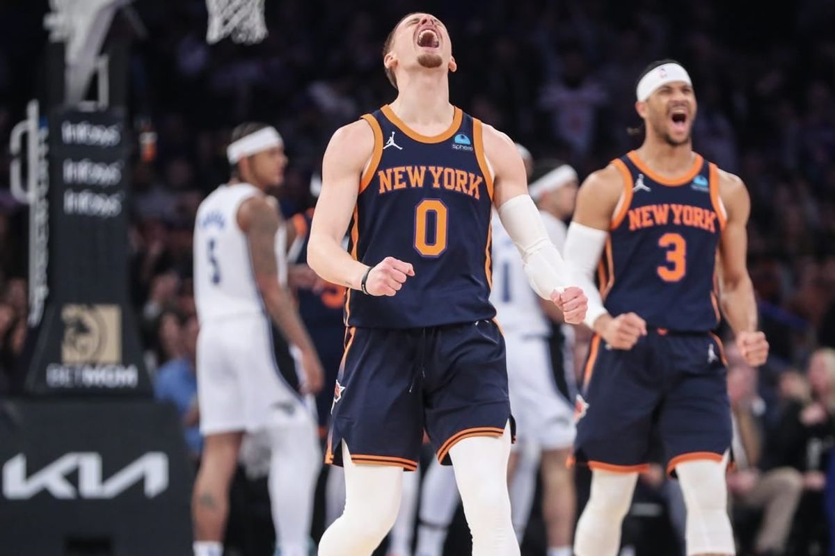 Mar 8, 2024; New York, New York, USA;  New York Knicks guard Donte DiVincenzo (0) celebrates in the first quarter against the Orlando Magic at Madison Square Garden.