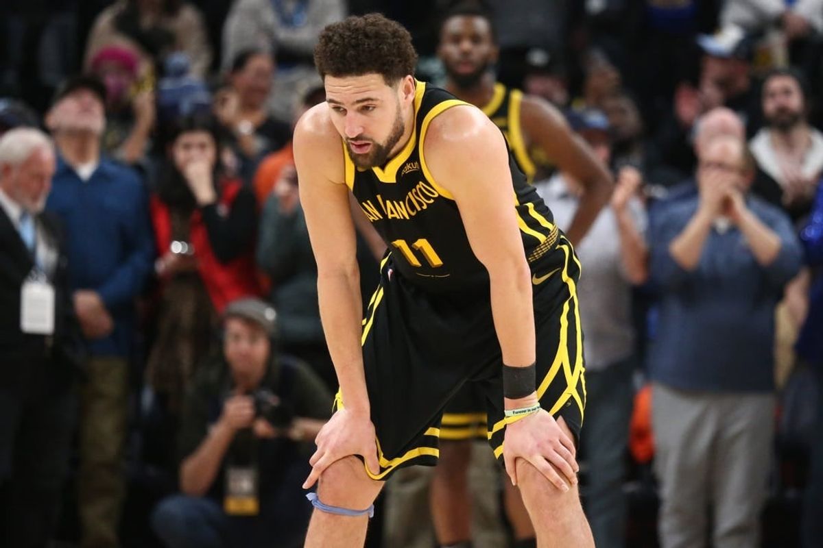 Jan 15, 2024; Memphis, Tennessee, USA; Golden State Warriors guard Klay Thompson (11) reacts during the second half against the Memphis Grizzlies at FedExForum.