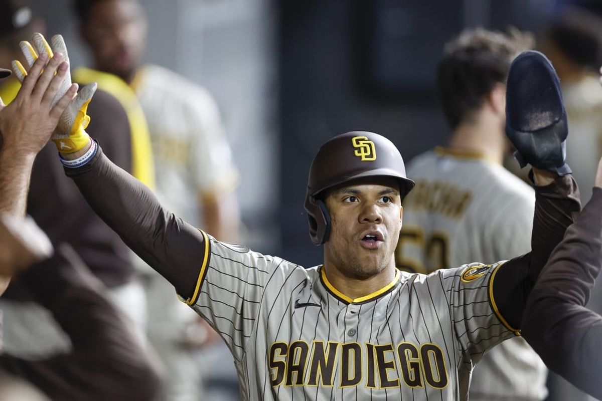 Sep 30, 2023; Chicago, Illinois, USA; San Diego Padres left fielder Juan Soto (22) celebrates with teammates after scoring against the Chicago White Sox during the second inning at Guaranteed Rate Field.