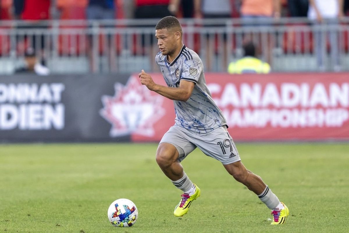 Jun 22, 2022; Toronto, Ontario, USA; CF Montreal defender Zorhan Bassong (19) moves the ball against Toronto FC at BMO Field
