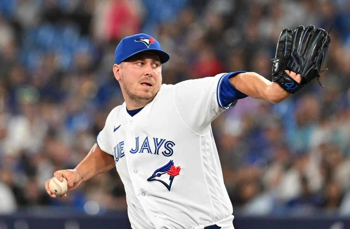 Jun 23, 2023; Toronto, Ontario, CAN;   Toronto Blue Jays relief pitcher Erik Swanson (50) delivers a pitch against the Oakland Athletics in the eighth inning at Rogers Centre.