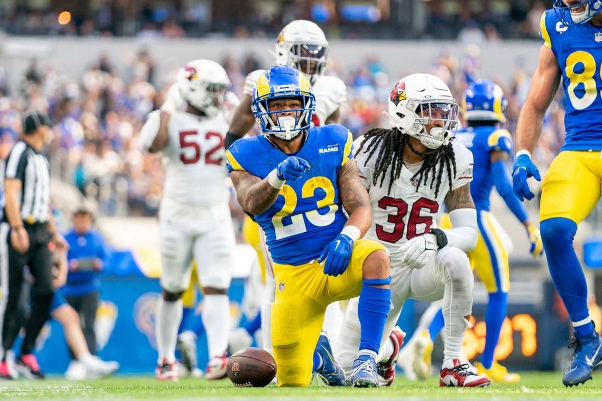 October 15, 2023; Inglewood, California, USA; Los Angeles Rams running back Kyren Williams (23) celebrates a first down during the third quarter against the Arizona Cardinals at SoFi Stadium.
