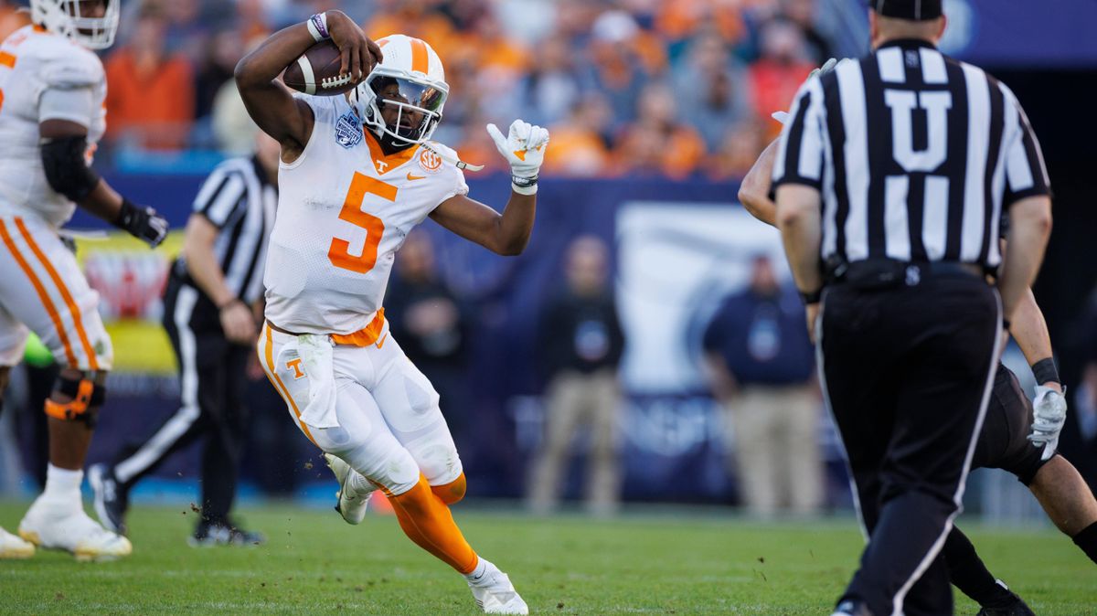 Hendon Hooker of Tennessee runs with the ball against the Purdue Boilermakers during the first half of the TransPerfect Music City Bowl.