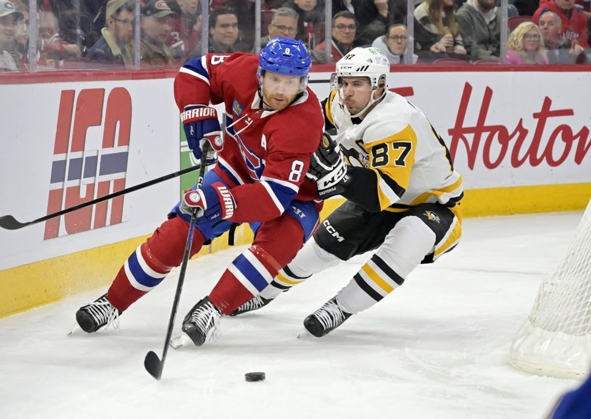 Dec 13, 2023; Montreal, Quebec, CAN; Pittsburgh Penguins forward Sidney Crosby (87) forechecks Montreal Canadiens defenseman Mike Matheson (8) during the first period at the Bell Centre.