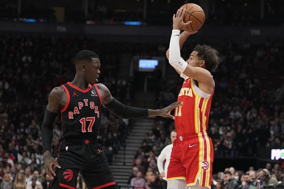 Dec 15, 2023; Toronto, Ontario, CAN; Toronto Raptors guard Dennis Schroder (17) defends against Atlanta Hawks guard Trae Young (11) during the first half at Scotiabank Arena.