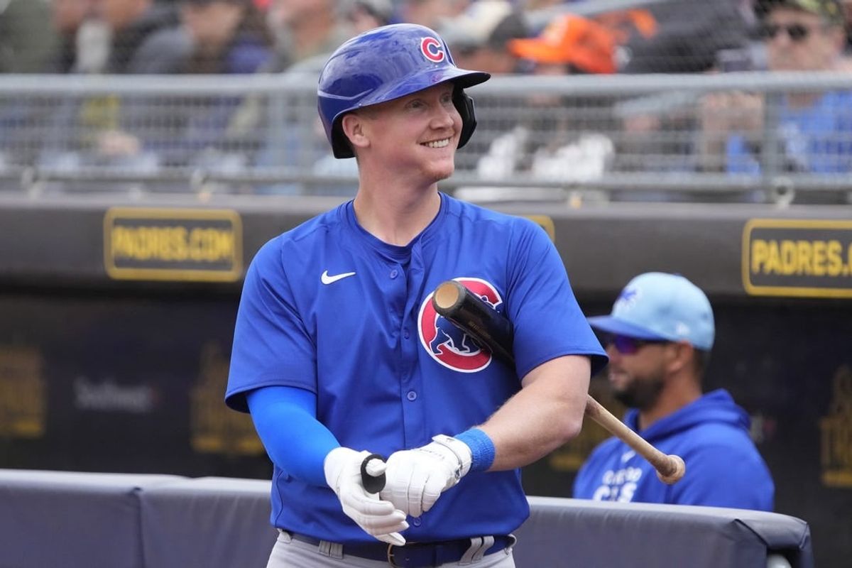 Mar 24, 2024; Peoria, Arizona, USA; Chicago Cubs left fielder Garrett Cooper (41) gets ready to hit against the Seattle Mariners in the first inning at Peoria Sports Complex.