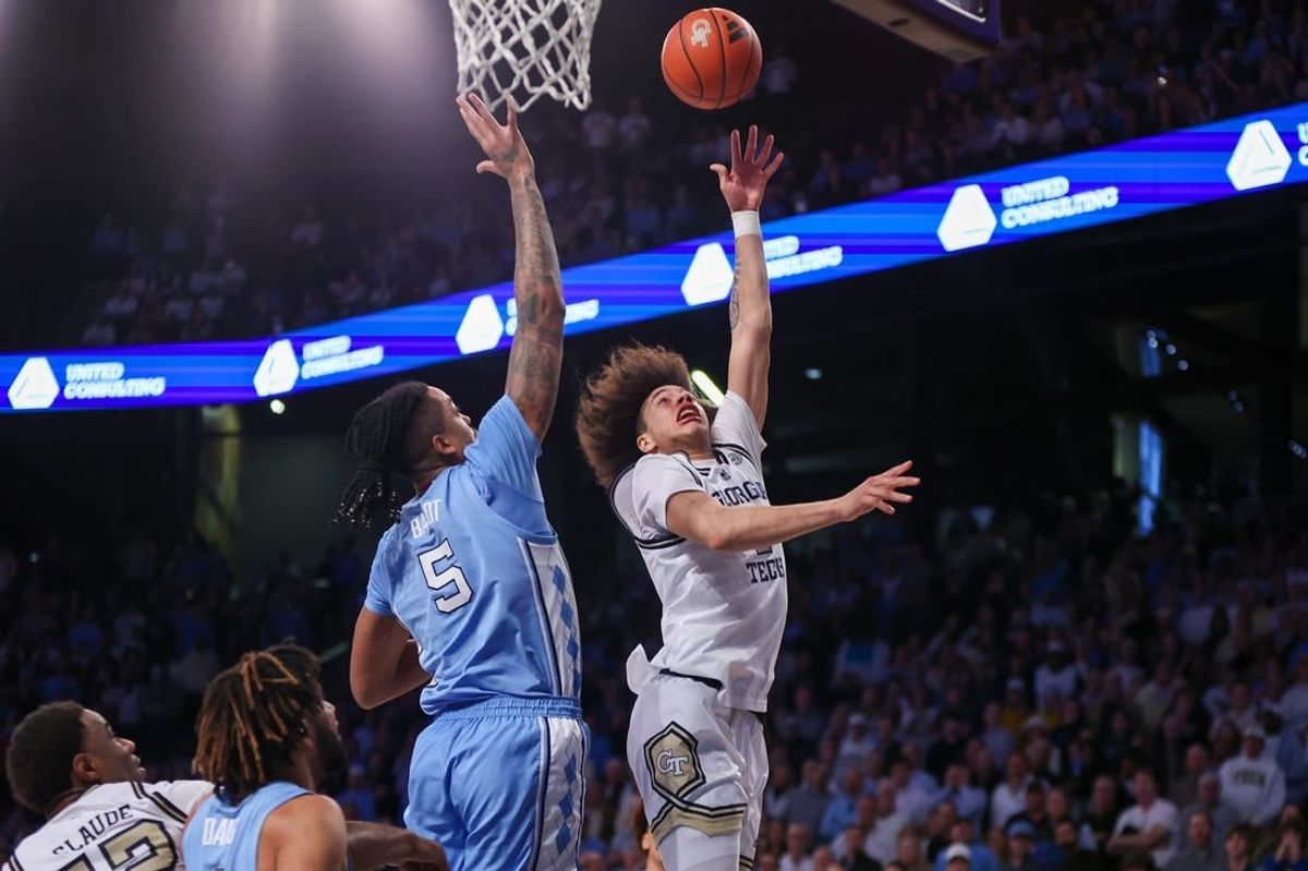 Jan 30, 2024; Atlanta, Georgia, USA; Georgia Tech Yellow Jackets guard Naithan George (2) shoots over North Carolina Tar Heels forward Armando Bacot (5) in the second half at McCamish Pavilion.