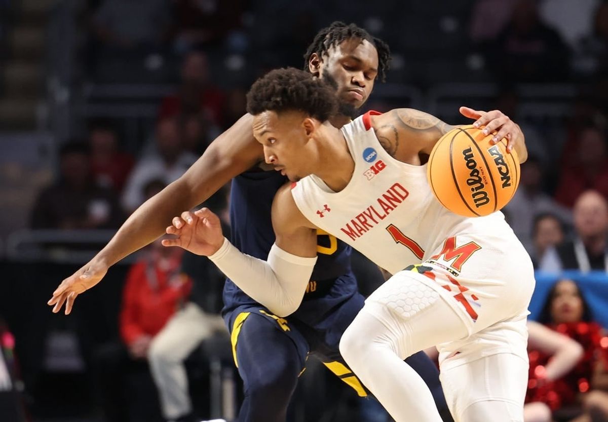 Mar 16, 2023; Birmingham, AL, USA; Maryland Terrapins guard Jahmir Young (1) dribbles against West Virginia Mountaineers guard Joe Toussaint (5) during the second half in the first round of the 2023 NCAA Tournament at Legacy Arena.
