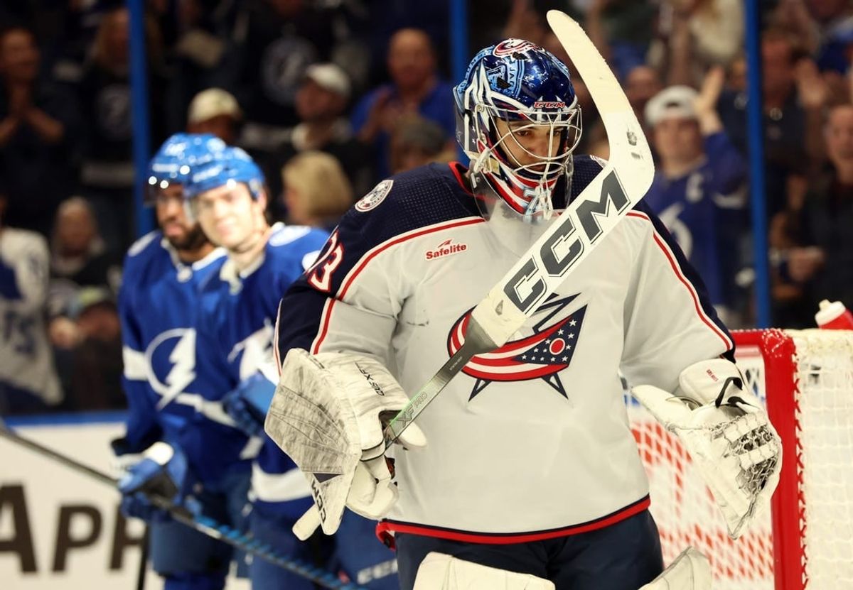 Apr 9, 2024; Tampa, Florida, USA; Columbus Blue Jackets goaltender Jet Greaves (73) looks on after he gave up a goal to Tampa Bay Lightning center Brayden Point (21) during the first period at Amalie Arena.