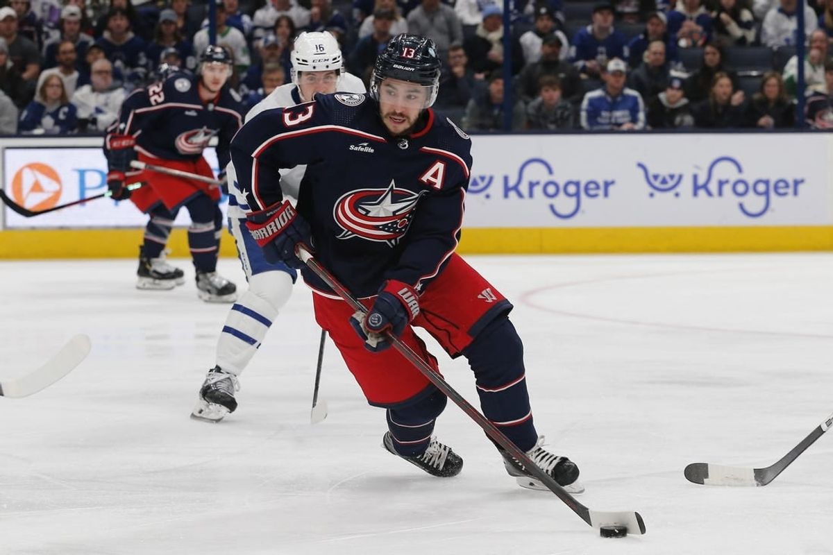 Dec 29, 2023; Columbus, Ohio, USA; Columbus Blue Jackets left wing Johnny Gaudreau (13) controls the puck against the Toronto Maple Leafs during the first period at Nationwide Arena.