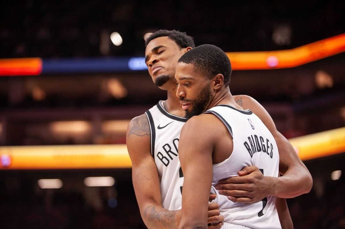 Dec 11, 2023; Sacramento, California, USA; Brooklyn Nets center Nic Claxton (33) and forward Mikal Bridges (1) embrace after a called foul during the fourth quarter against the Sacramento Kings at Golden 1 Center.