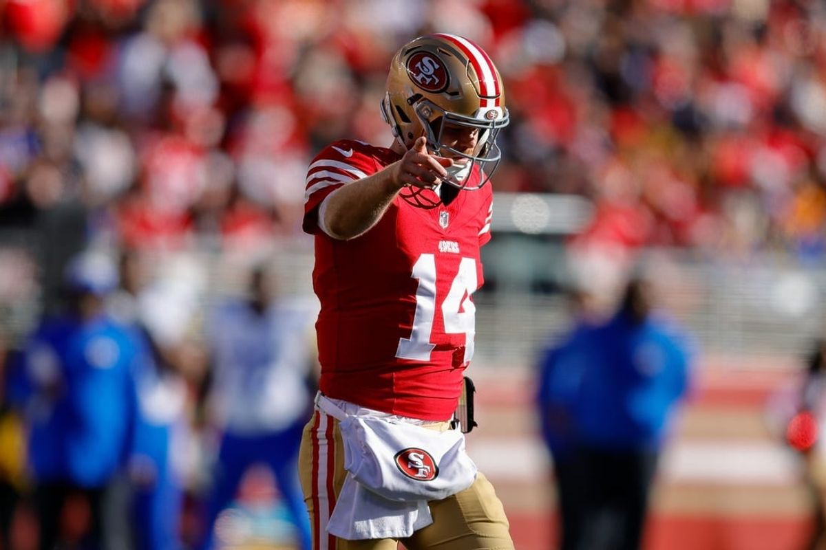 Jan 7, 2024; Santa Clara, California, USA; San Francisco 49ers quarterback Sam Darnold (14) celebrates after a play during the second quarter against the Los Angeles Rams at Levi's Stadium.