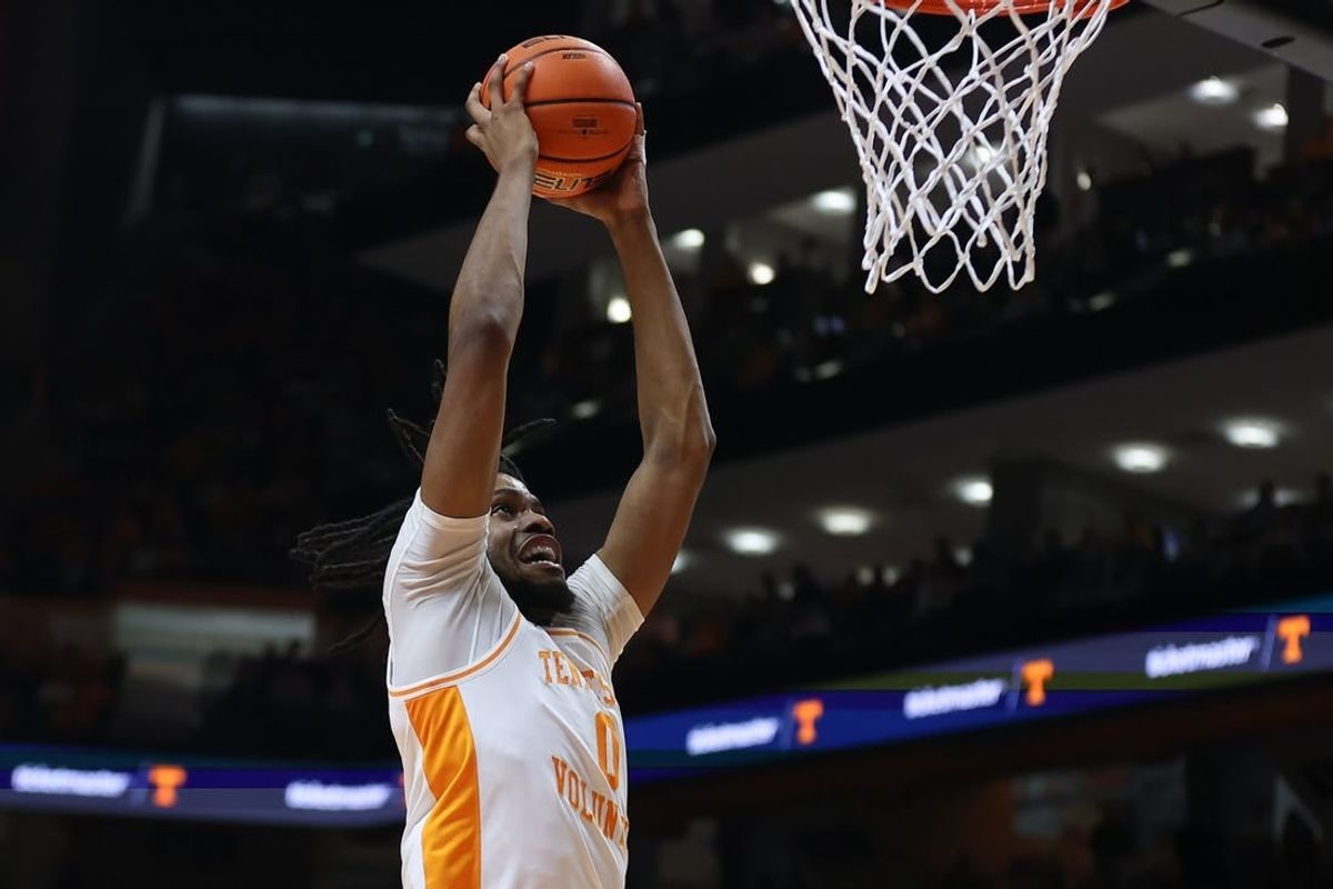 Jan 6, 2024; Knoxville, Tennessee, USA; Tennessee Volunteers forward Jonas Aidoo (0) dunks the ball against the Mississippi Rebels during the first half at Thompson-Boling Arena at Food City Center.
