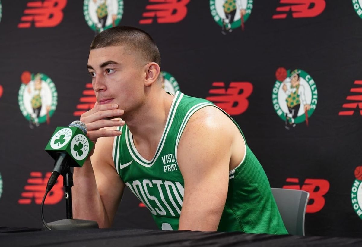 Oct 2, 2023; Boston, Celtics, USA; Boston Celtics guard Payton Pritchard (11) talks with sports media during Boston Celtics Media Day.
