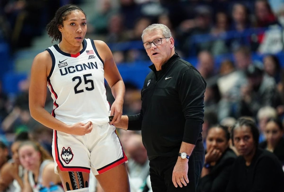 Nov 8, 2023; Hartford, Connecticut, USA; UConn Huskies head coach Geno Auriemma talks with forward Ice Brady (25) from the sideline as they take on the Dayton Flyers at XL Center.