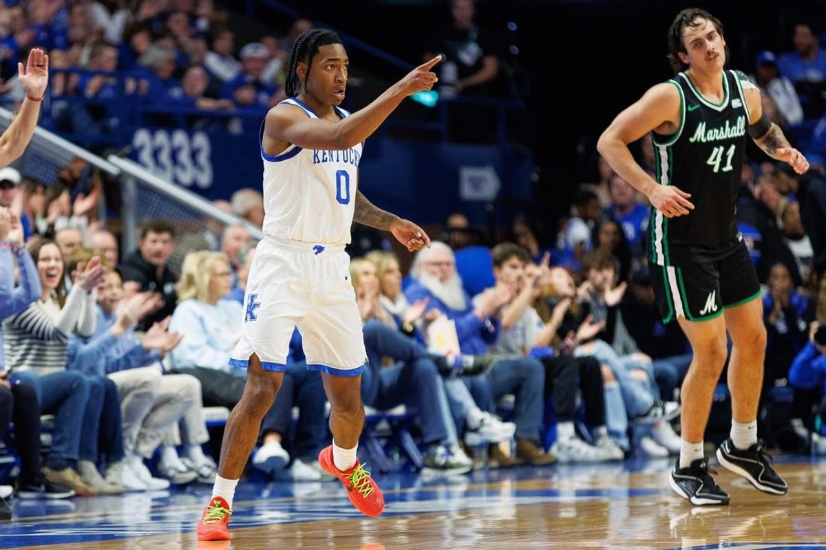 Nov 24, 2023; Lexington, Kentucky, USA; Kentucky Wildcats guard Rob Dillingham (0) celebrates after making a basket during the first half against the Marshall Thundering Herd at Rupp Arena at Central Bank Center.