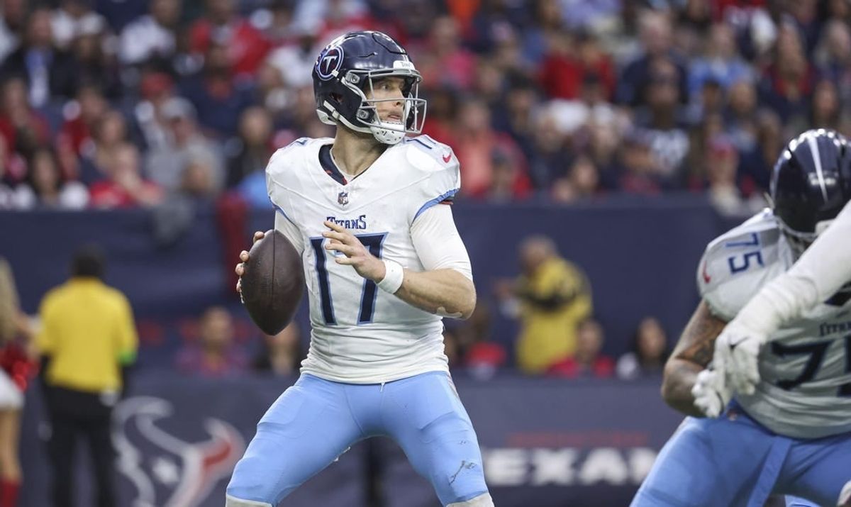 Dec 31, 2023; Houston, Texas, USA; Tennessee Titans quarterback Ryan Tannehill (17) looks for an open receiver during the fourth quarter against the Houston Texans at NRG Stadium.