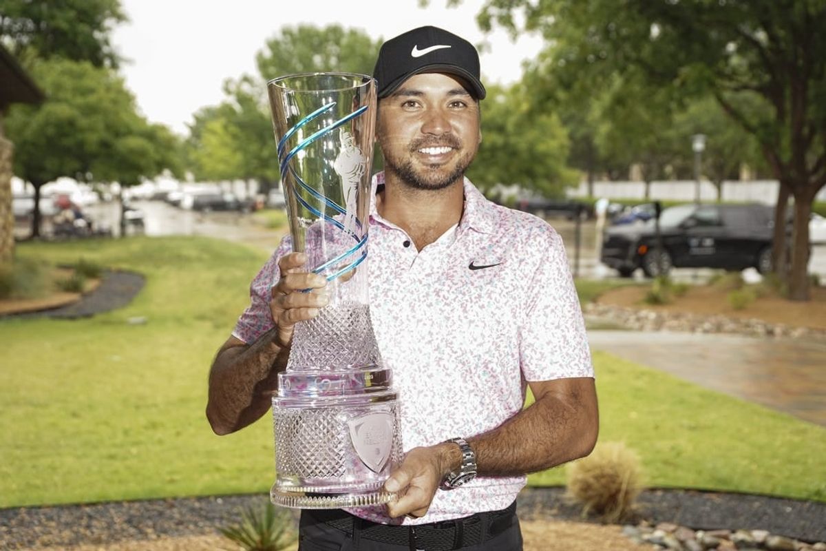 May 14, 2023; McKinney, Texas, USA; Jason Day poses with the winner's trophy during the final round of the AT&T Byron Nelson golf tournament.