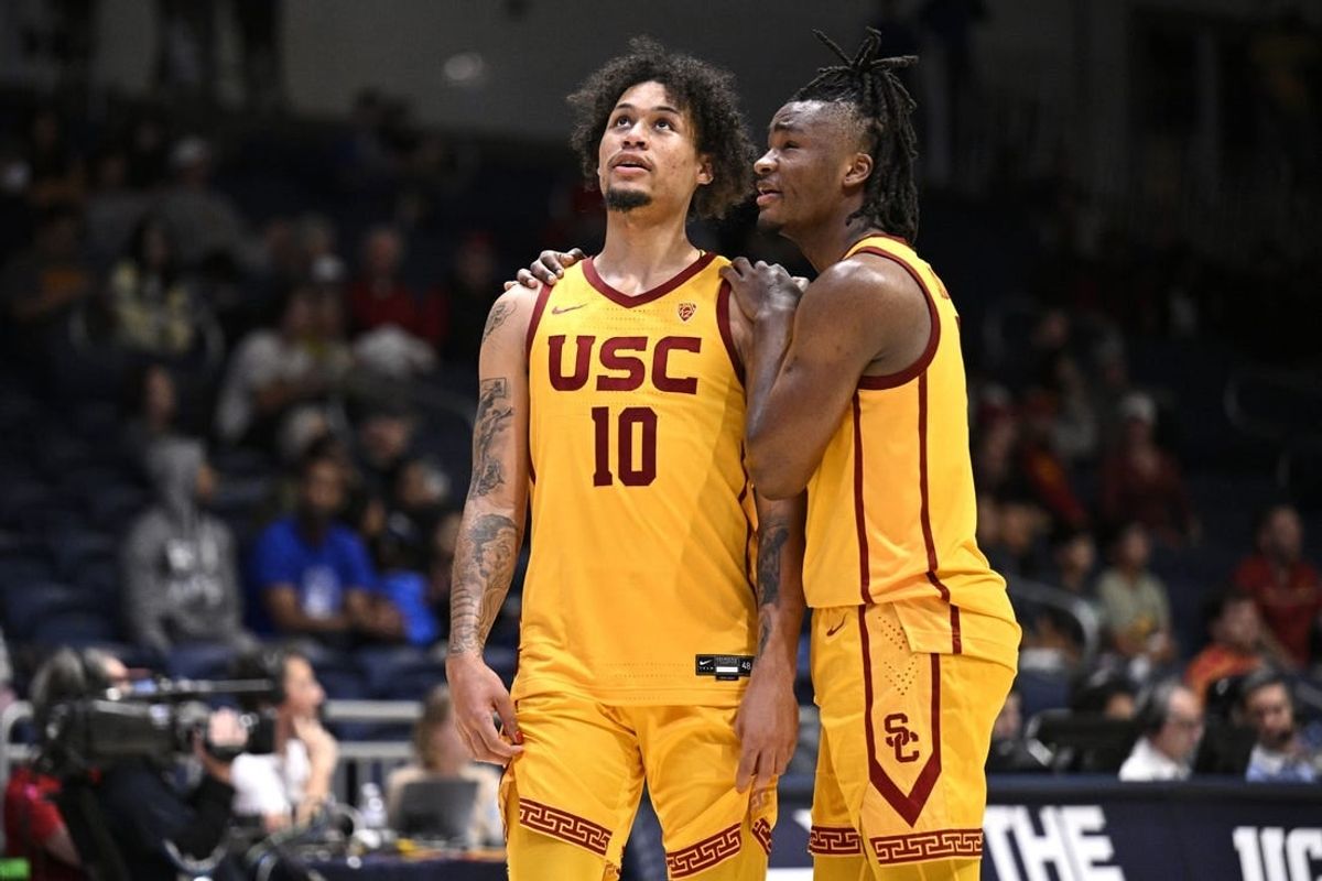 Nov 23, 2023; La Jolla, California, USA; USC Trojans forward DJ Rodman (10) and guard Isaiah Collier (1) embrace during the second half against the Seton Hall Pirates at LionTree Arena.