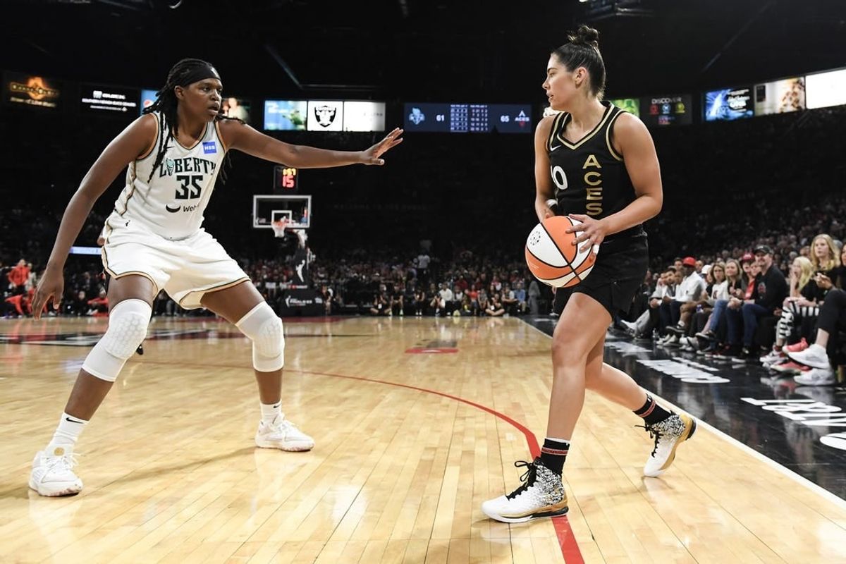 Oct 8, 2023; Las Vegas, Nevada, USA; New York Liberty forward Jonquel Jones (35) defends against Las Vegas Aces guard Kelsey Plum (10) in the second half during game one of the 2023 WNBA Finals at Michelob Ultra Arena.