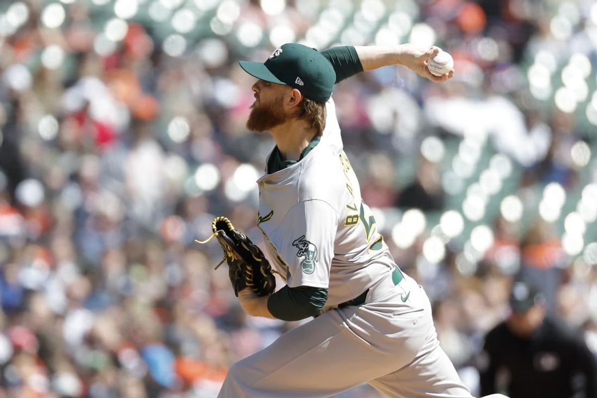 Apr 6, 2024; Detroit, Michigan, USA;  Oakland Athletics starting pitcher Paul Blackburn (58) throws against the Detroit Tigers in the first inning at Comerica Park.