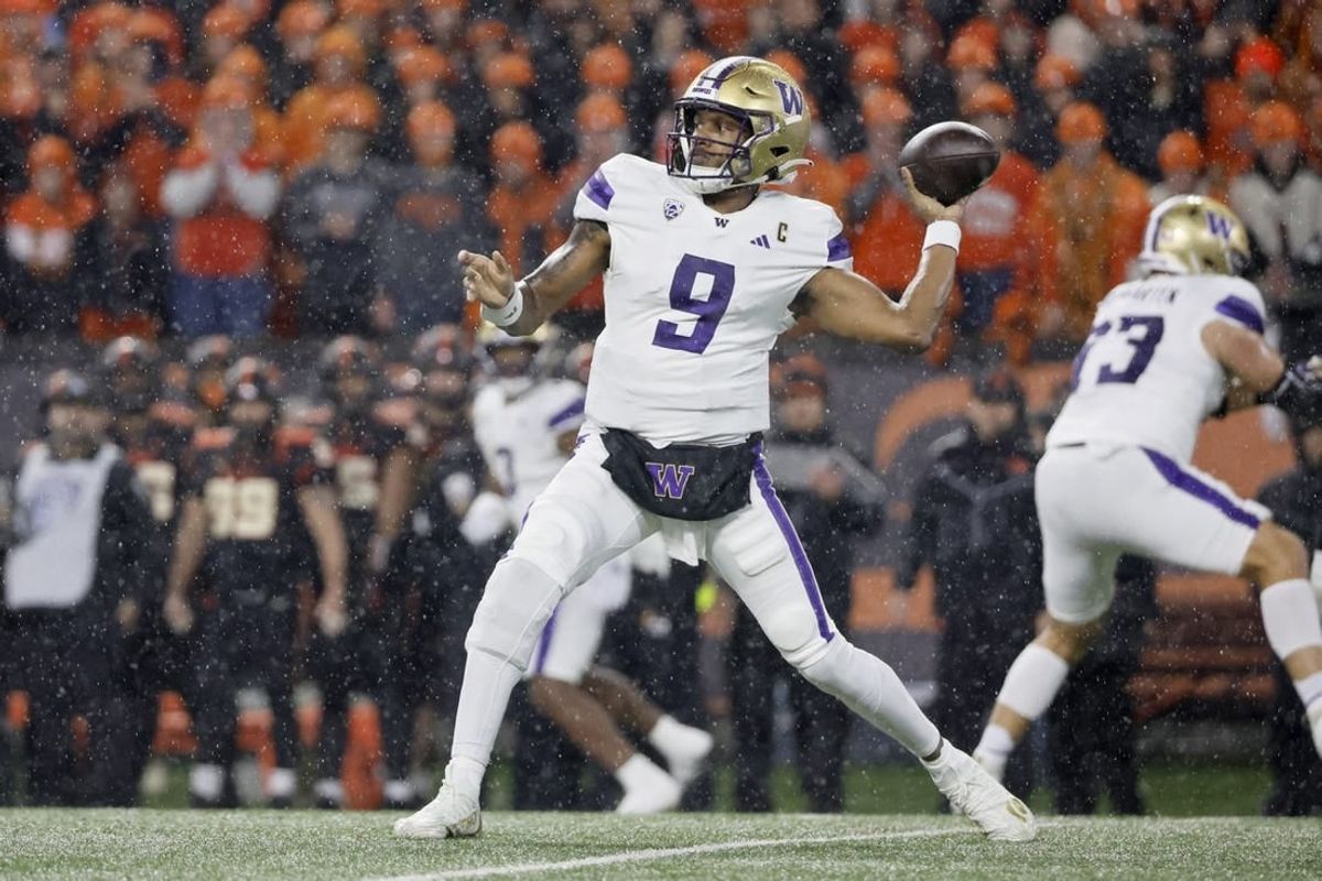 Nov 18, 2023; Corvallis, Oregon, USA; Washington Huskies quarterback Michael Penix Jr. (9) throws the ball during the first half against the Oregon State Beavers at Reser Stadium.